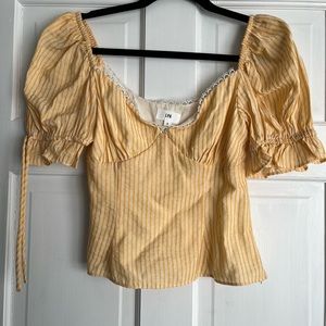 LPA cropped peasant top with puff sleeves.